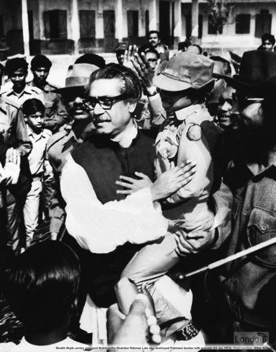 Sheikh Mujibur Rahman carrying youngest Bir Protik Shahidur Rahman Lalu who destroyed Pakistani bunker with grenade, 24 January 1972